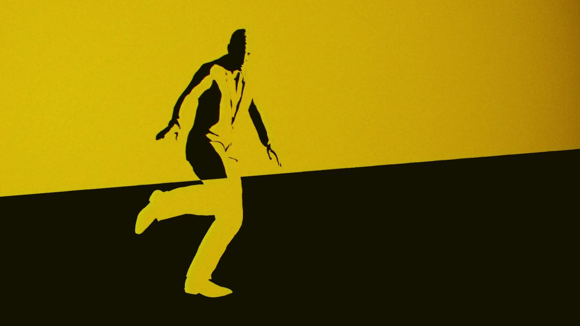 Tapis Jaune, séquence dansée en silhouette